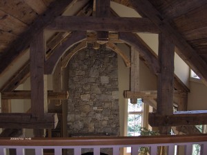 Beautiful, hand made antique trusses in the Great Room are a great example of the incredible details in this home!