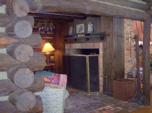 Small study, located right off the great room, features large wood-burning fireplace.
